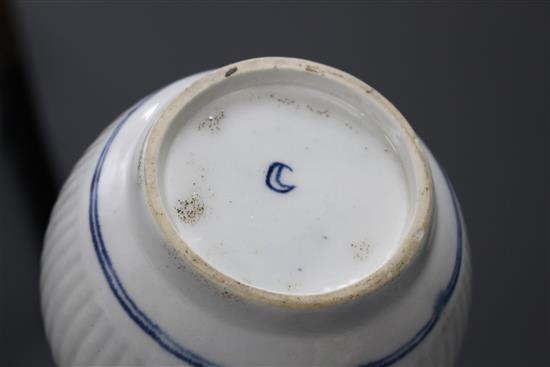 A Worcester blue and white coffee pot and cover, sugar bowl and cover and milk jug, c.1760-75 and a New Hall type teapot and cover c. 1
